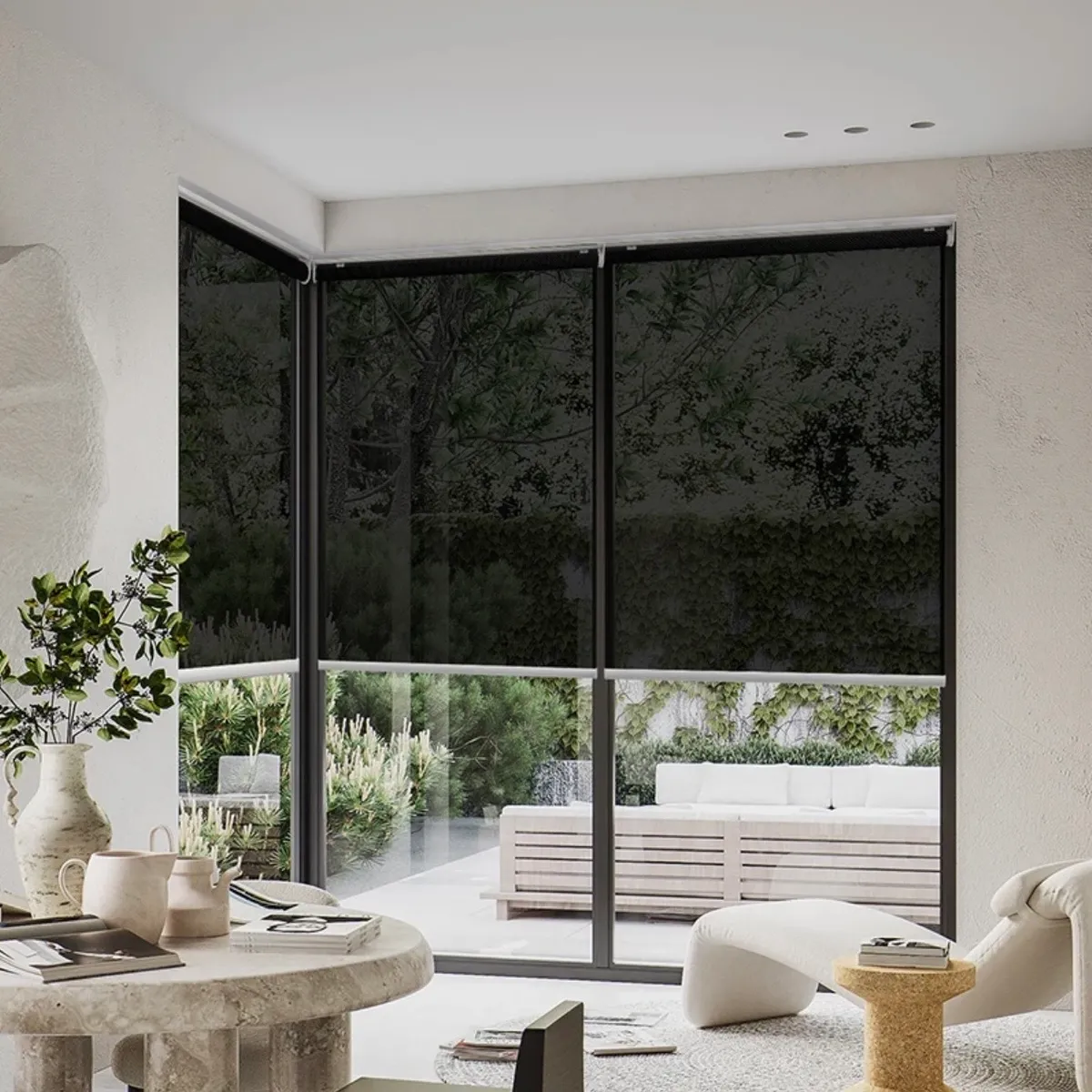 Corner sliding glass doors with dark motorized solar shades lowered, overlooking a landscaped pool patio